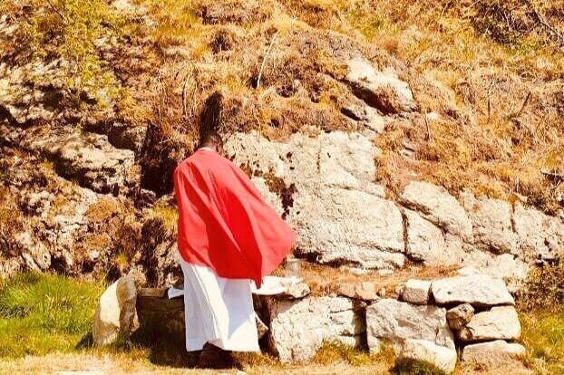 Fr Peter celebrates Mass at a rock altar in Armagh