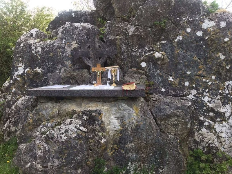 Clara Mass Rock altar with a crucifix and chalice