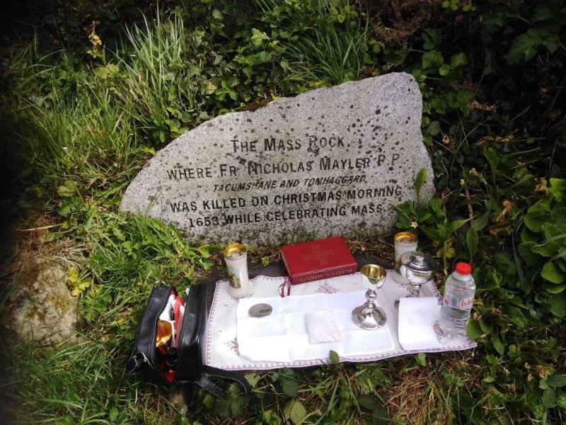 Tomhaggard Mass Rock altar beneath an inscribed stone