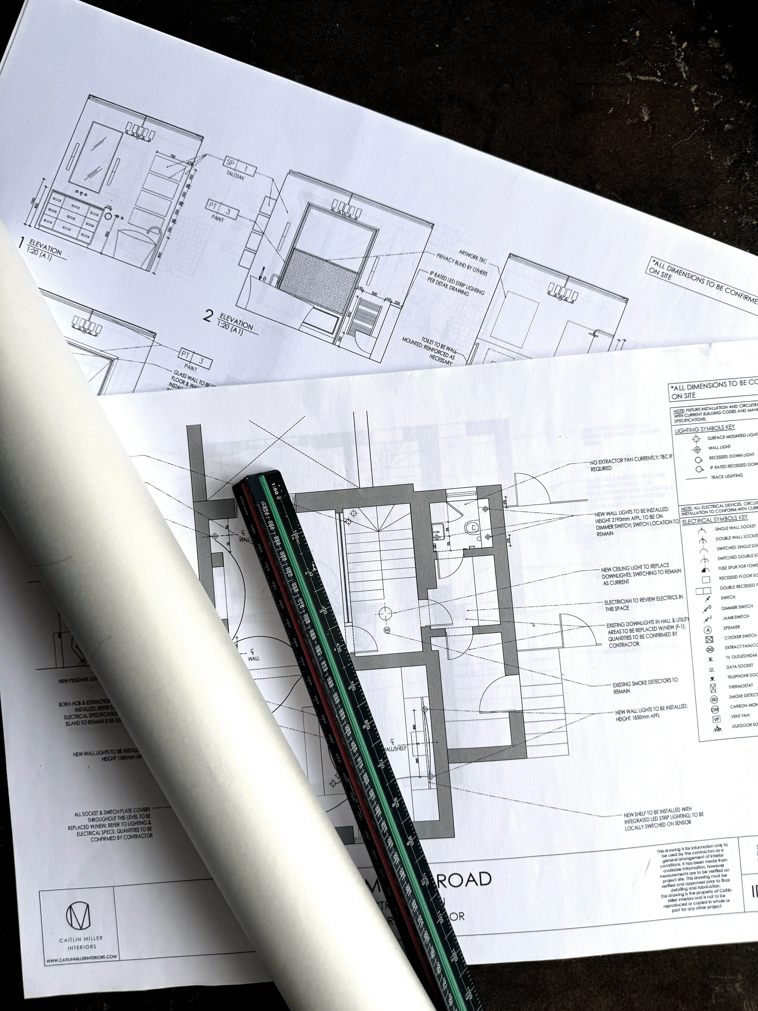 Interior architectural sketch of a building's floor plan with electrical layout overlaid on rooms, measurements, and notes.