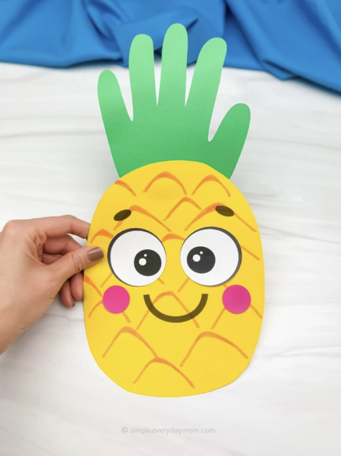 Handprint Pineapple Craft - Simple Everyday Mom.png