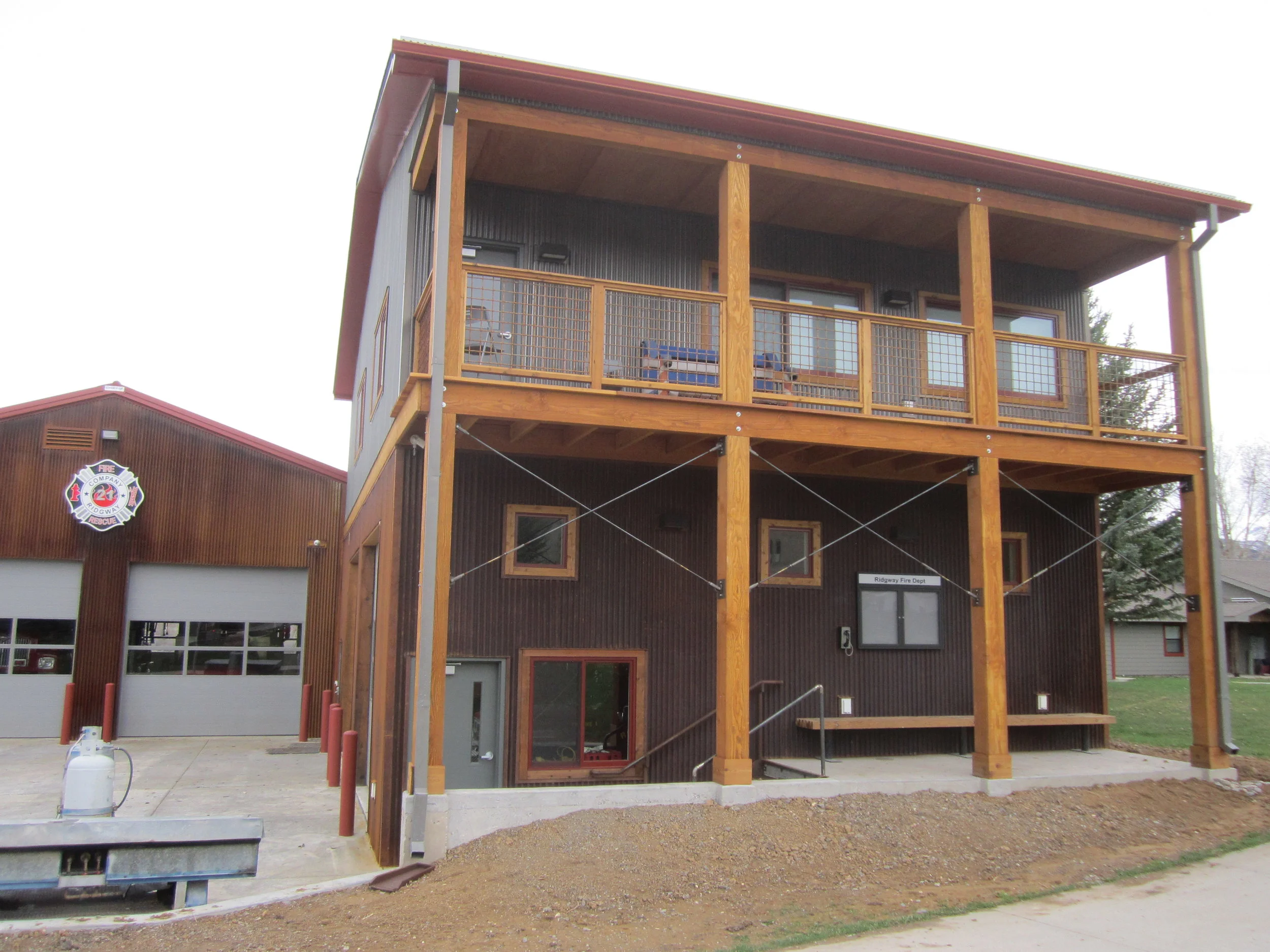   RIDGWAY FIRE STATION WITH THE COOL UPPER DECK OVERLOOKING THE PARK.  THIS DECK IDEA WAS A GKH DESIGN FEATURE.  