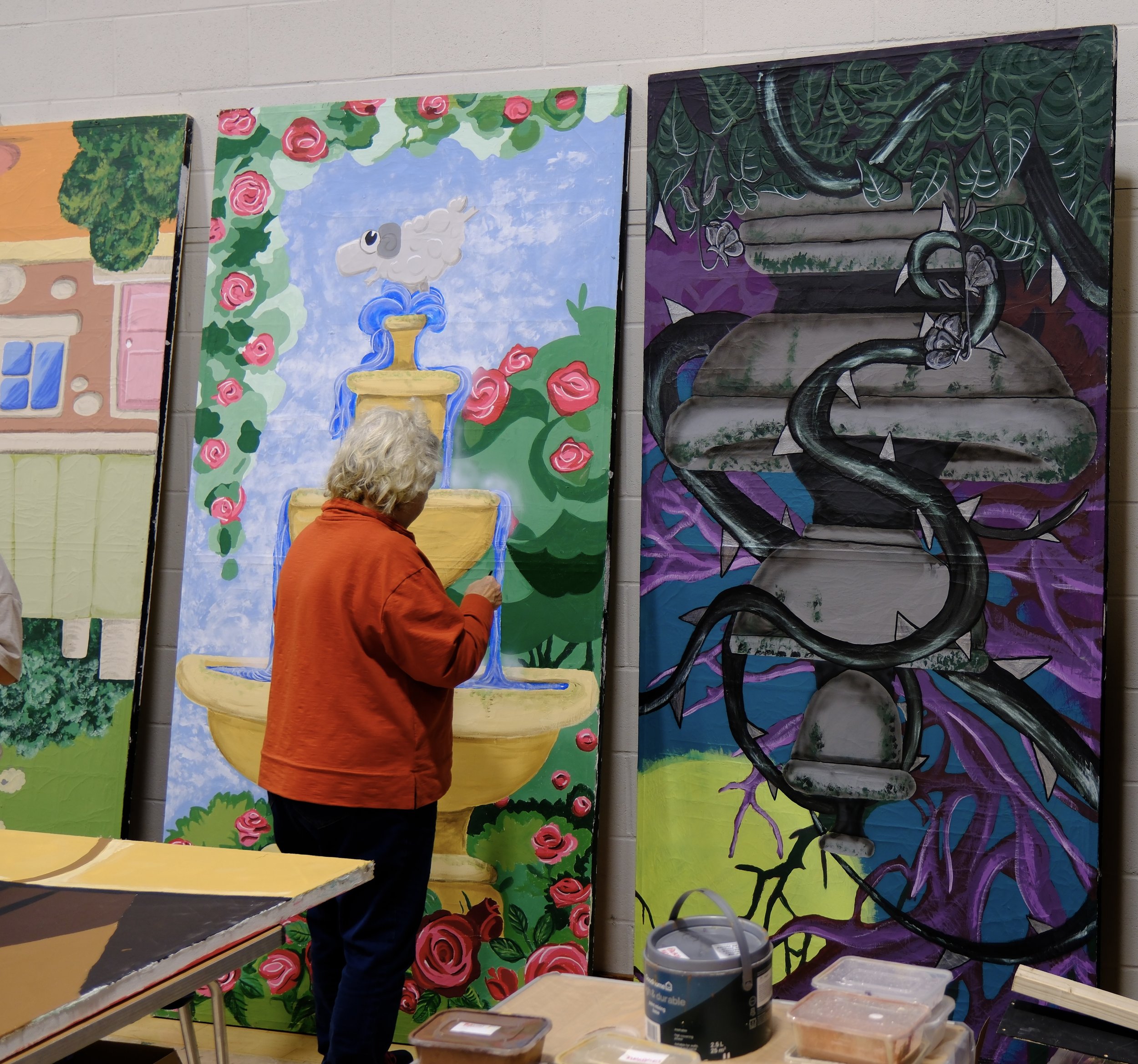 Painting sometimes has to be done upside down when you are short and the flats tall! Photo credit Justin Holister
