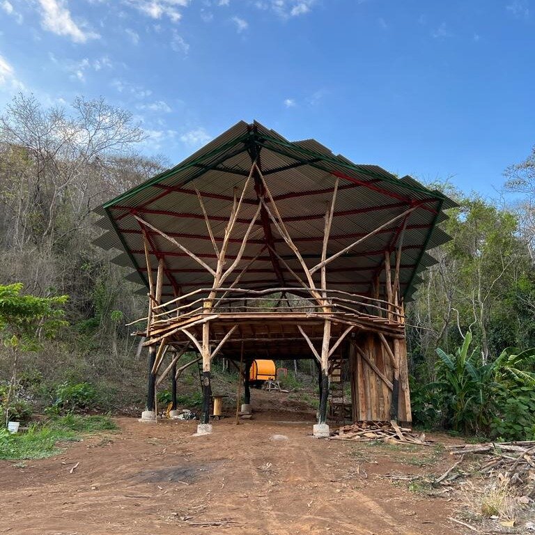 [EN] Building at our Camarita Regenerative Center is nearly complete! This handcrafted building will host our educational programs and provide shade and shelter for our staff who manage our nursery and agroforestry area. Keep following us for more ex