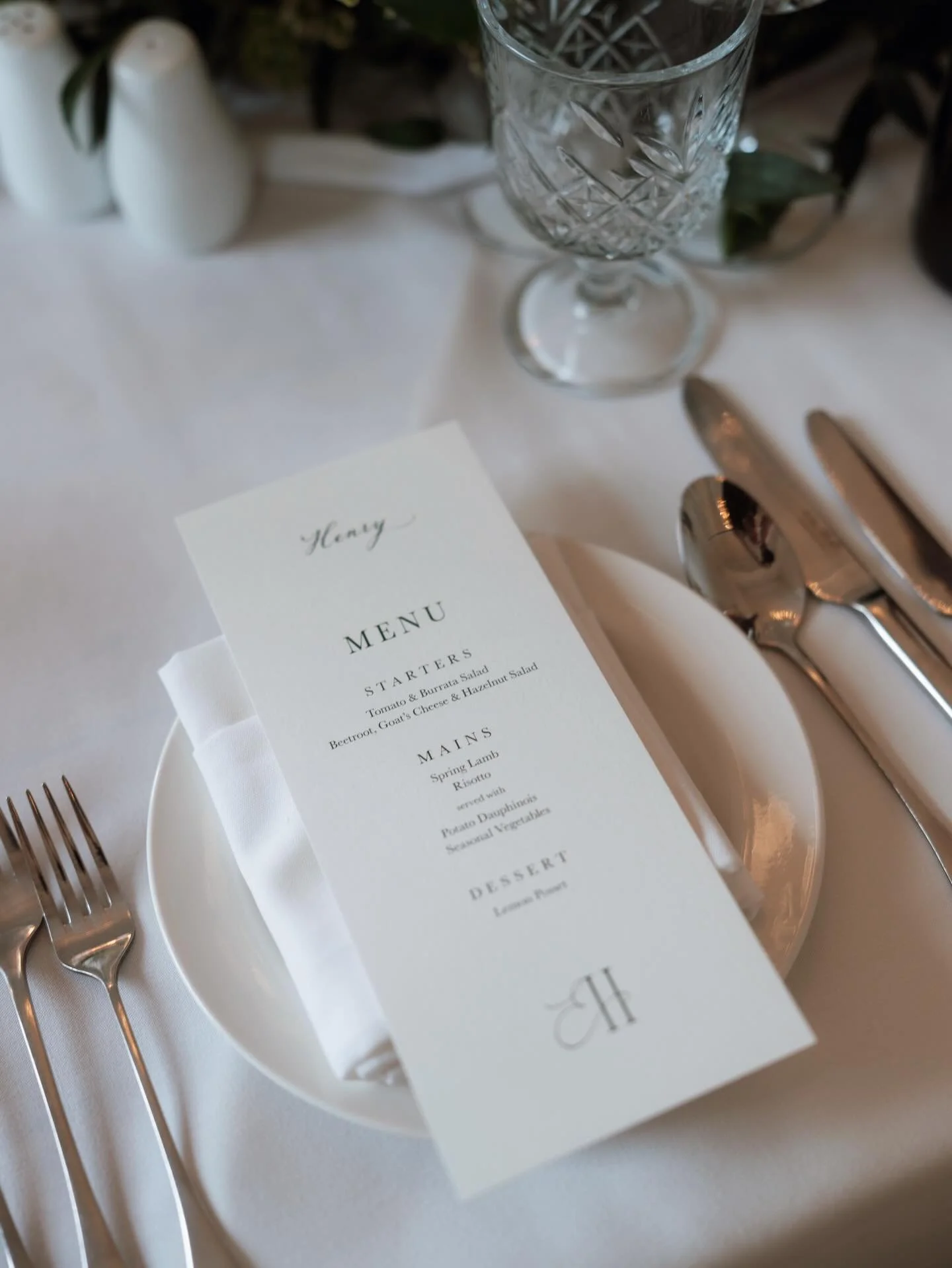 When having a sharing meal instead of plated, space on the table is an important consideration and necessary to avoid a cluttered look to your table styling. Instead of an additional placecard, guest names were added to these menus in calligraphy usi