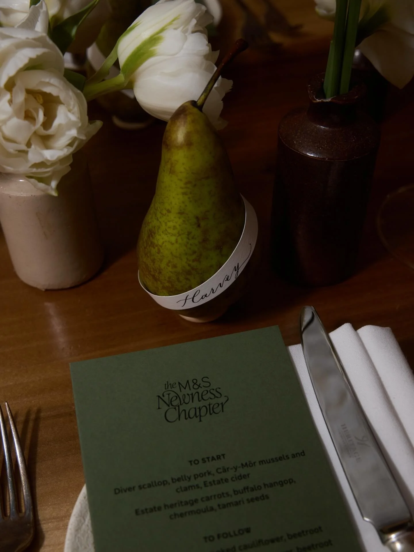 I loved the use of a pear as a name card holder at this @marksandspencer event. It created an unexpected tablescape detail &amp; added texture &amp; visual interest for guests. 🍐
.
.
Trip itinerary, creative production &amp; styling:
@kateproduces 
