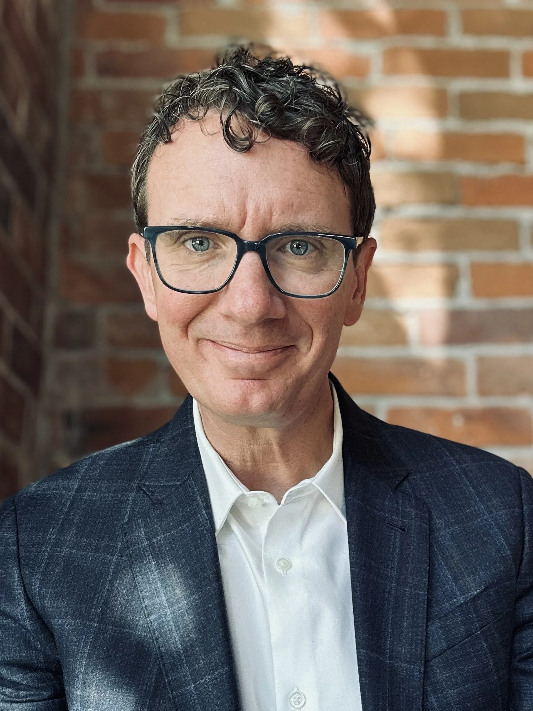 Brian Doak Head Shot Brick Wall.jpeg