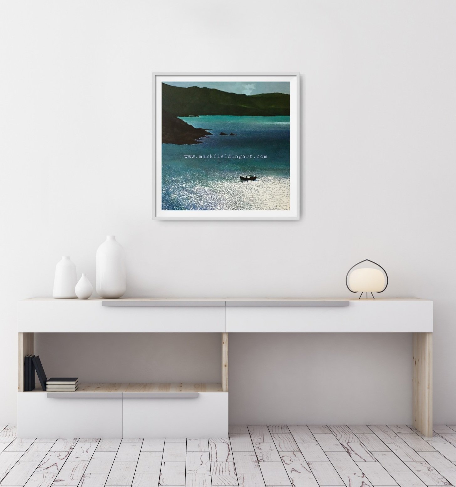 Framed print of fishing boat sea view on the wall.jpg