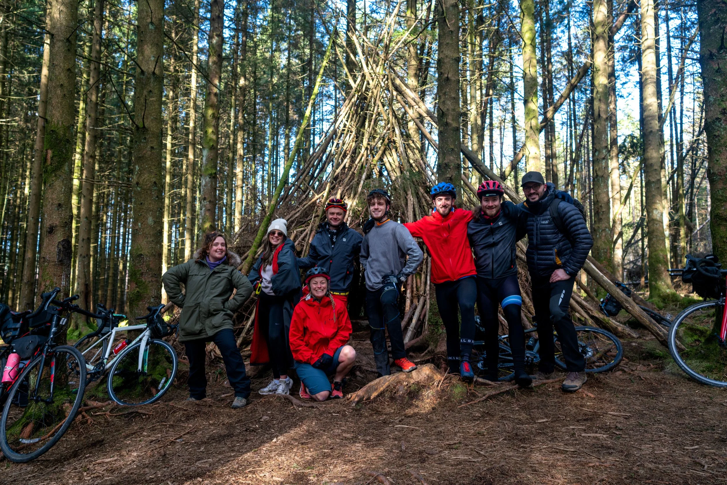 people hiking in the forest