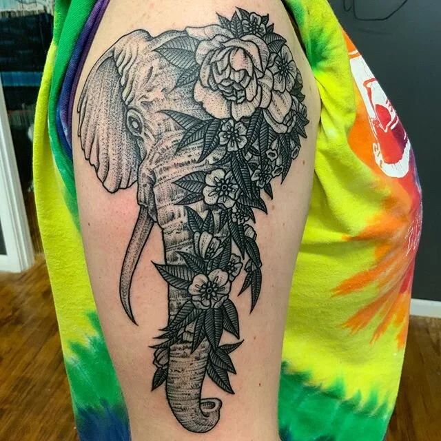 Based off of a design customer brought in. Tattoo by Dean. Thanks!🐘🌸