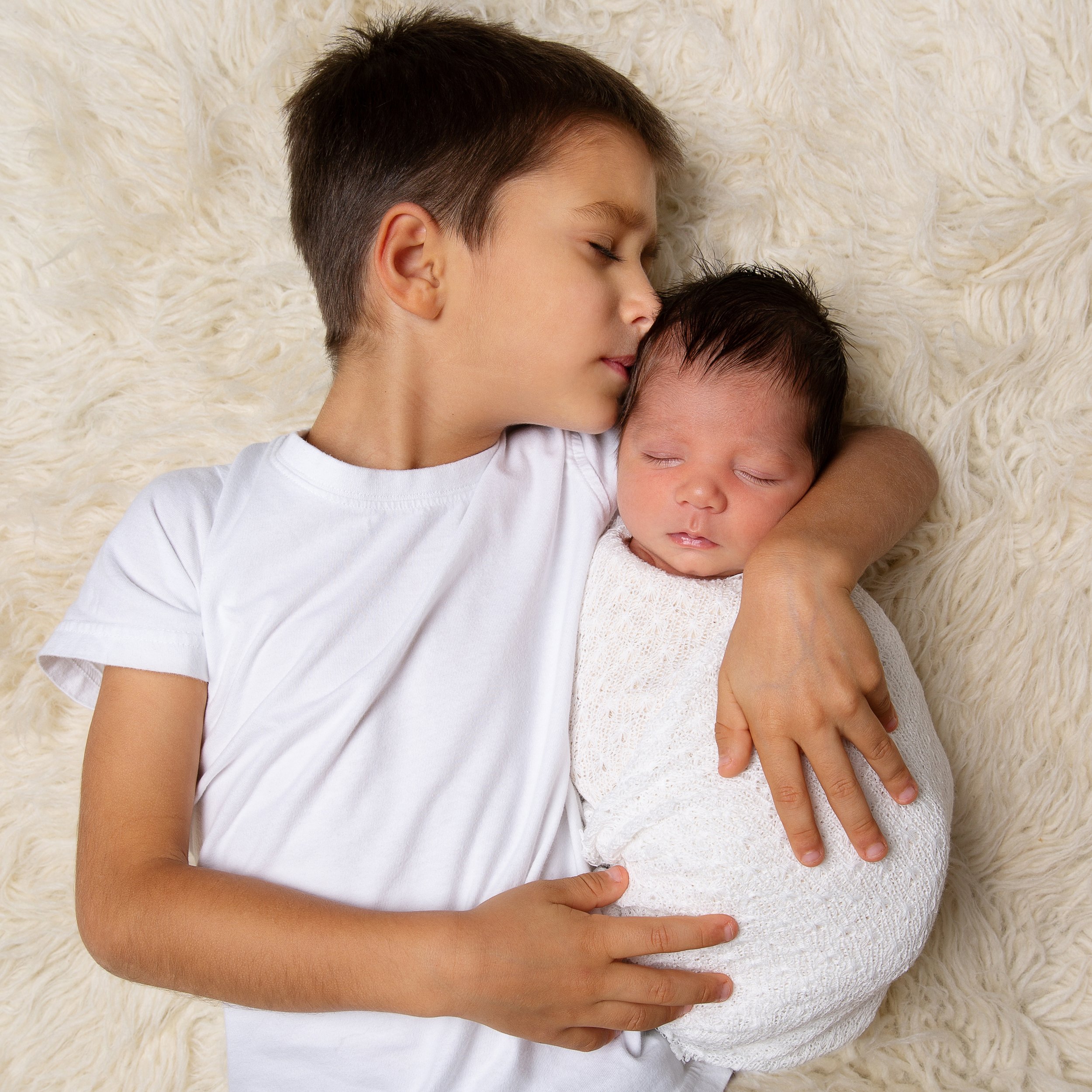 In-Home newborn photography with sibling