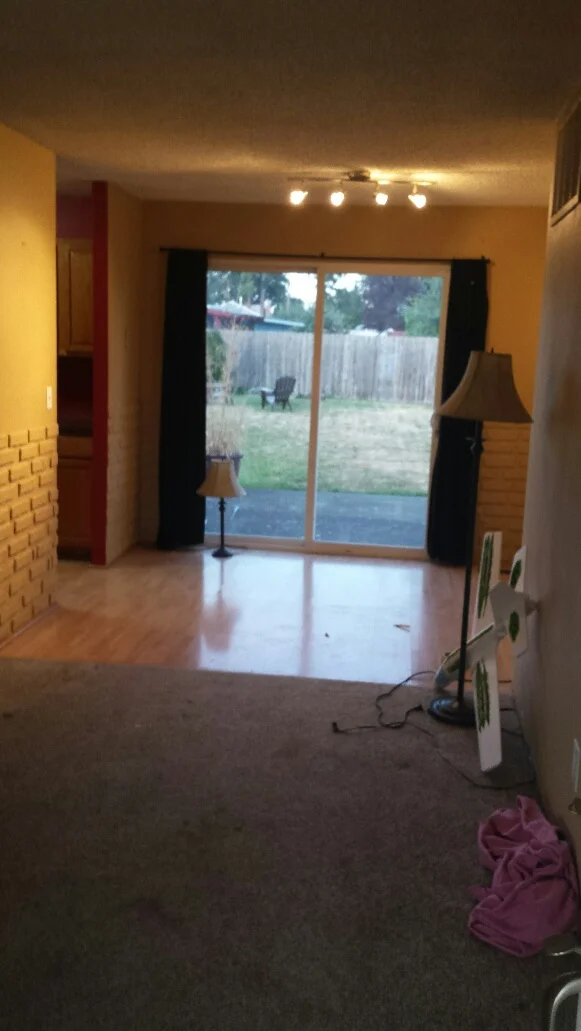 The kitchen laminate wood flooring had been damaged by water.  The wood was attractive yet once damaged difficult to repair without complete replacement.