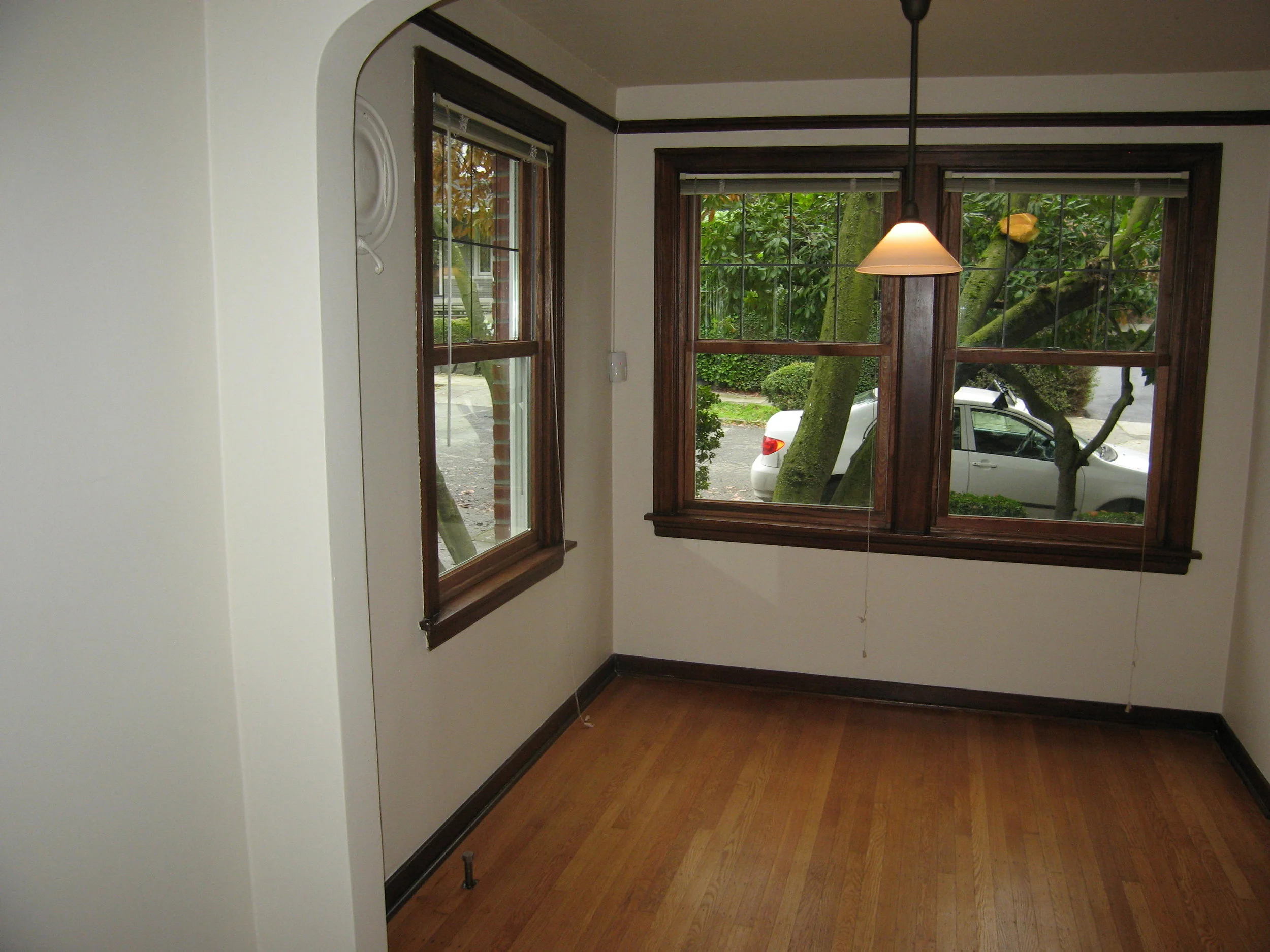 Dining room with new oil rubbed bronze pendant light fixture.