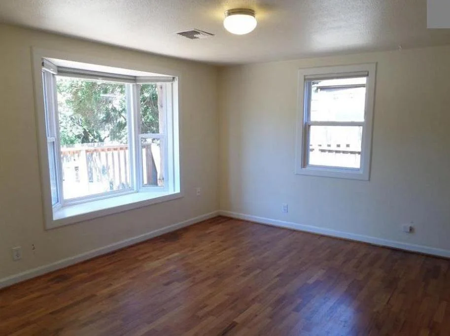Figure 2: View of living room corner where circular stair would be placed.