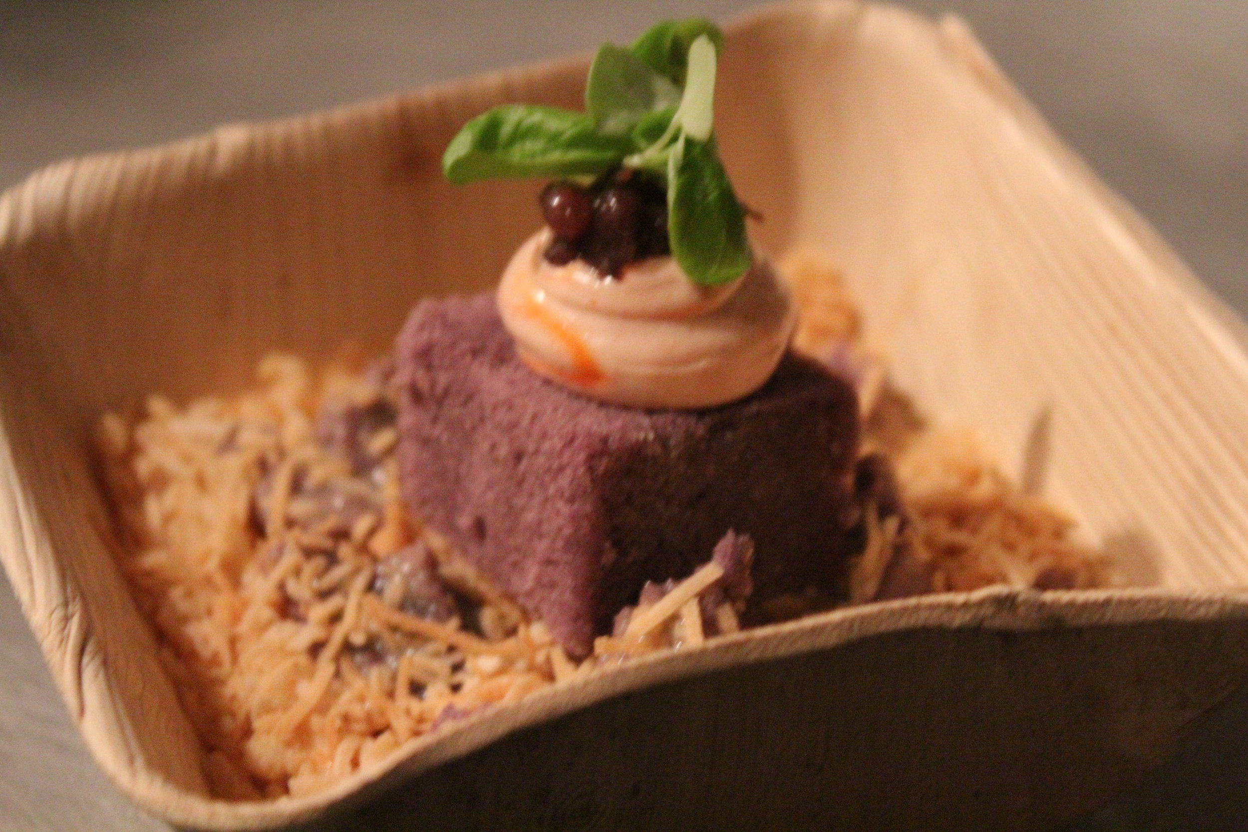  Not so literal. His Halo Halo is a chunk of purple yam cake, condensed almond milk, puffed rice and toasted coconut. 