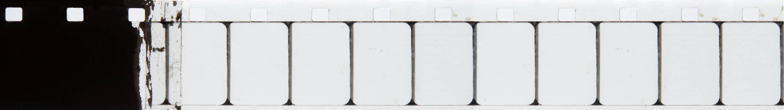 A negative strip of film showing old black-and-white images.