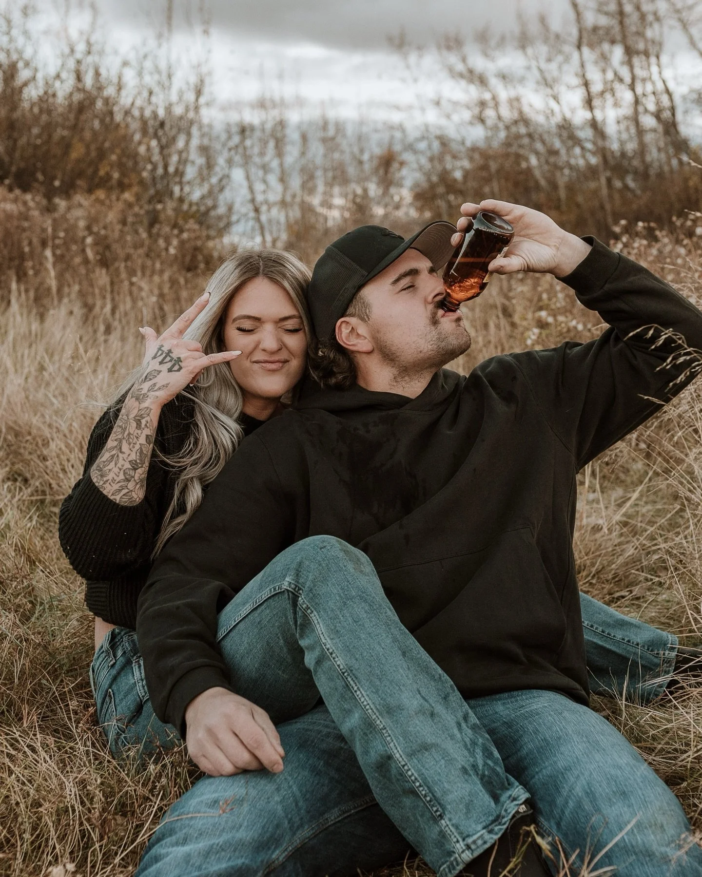 Pouring beers into each other&rsquo;s mouths like it&rsquo;s their love language. This wasn&rsquo;t a cute, quiet couples session. This was Coors stubbies cracking open, beer pouring mouth-to-mouth, laughter turning feral, and the kind of chaos that 