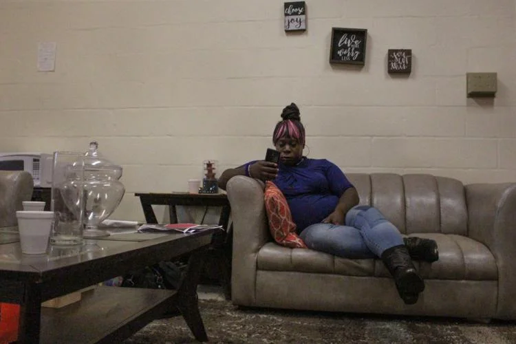 Monica Love, 25, sits in a back room of GRACE Marketplace, a Gainesville homeless shelter. She’s been in and out of GRACE for the past four years. “It gets better but it’s more of what you make it,” Love said. Dana Cassidy / Alligator Staff