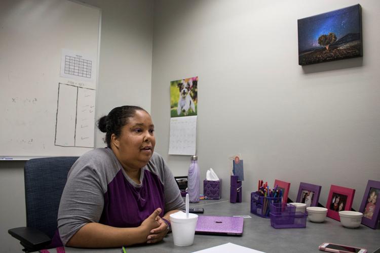 Melissa Shabazz, a UF math lecturer, works in her office Saturday in Little Hall. Shabazz is the only African American professor in her department. She started working at UF during Fall 2018. Samuel Thomas / Alligator Staff