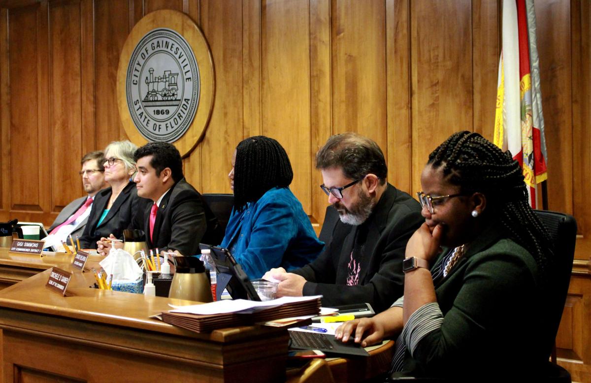 Mayor Lauren Poe and Gainesville city commissioners listen to the public’s comments Thursday during the Gainesville City Commission meeting at City Hall. The meeting was over four hours long, and the panel of legislators passed legislation that banned the use of plastic bags in Gainesville. Nicole Needles / Alligator Staff