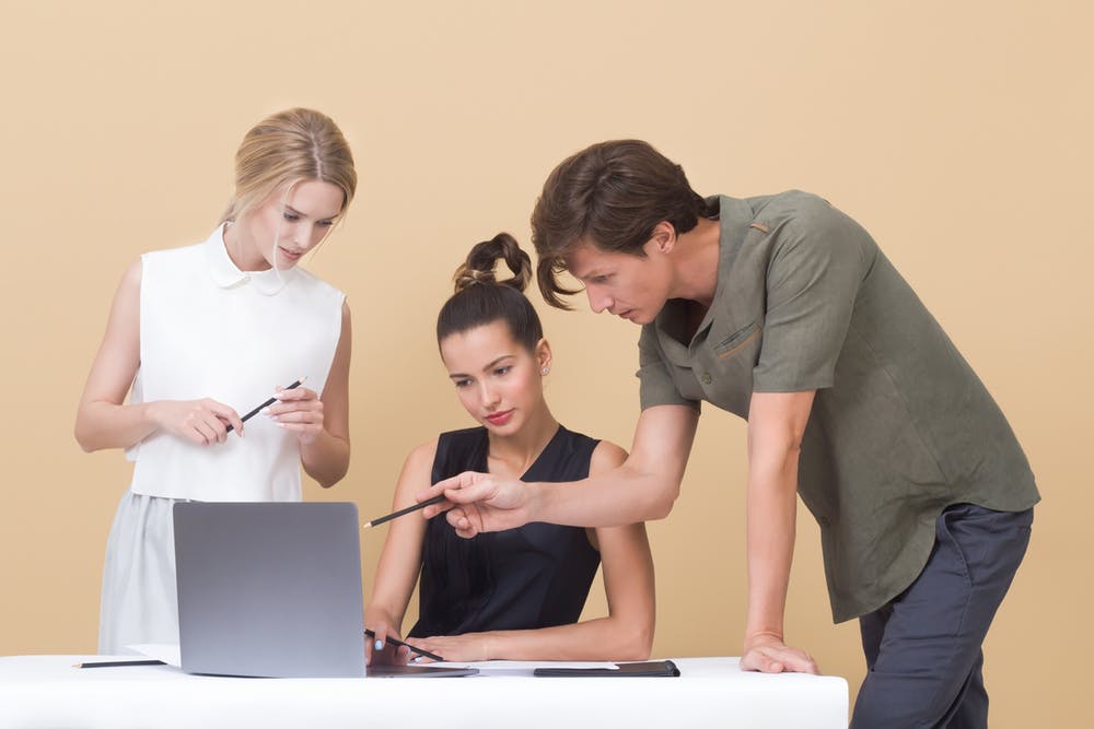 nvw-solutions-support-local-magazine-sme-feedback-customers-three-people-laptop.jpeg