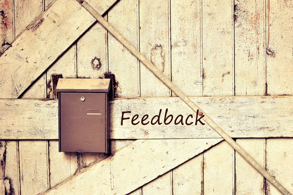 nvw-solutions-support-local-magazine-sme-feedback-customers-wooden-wall.jpeg