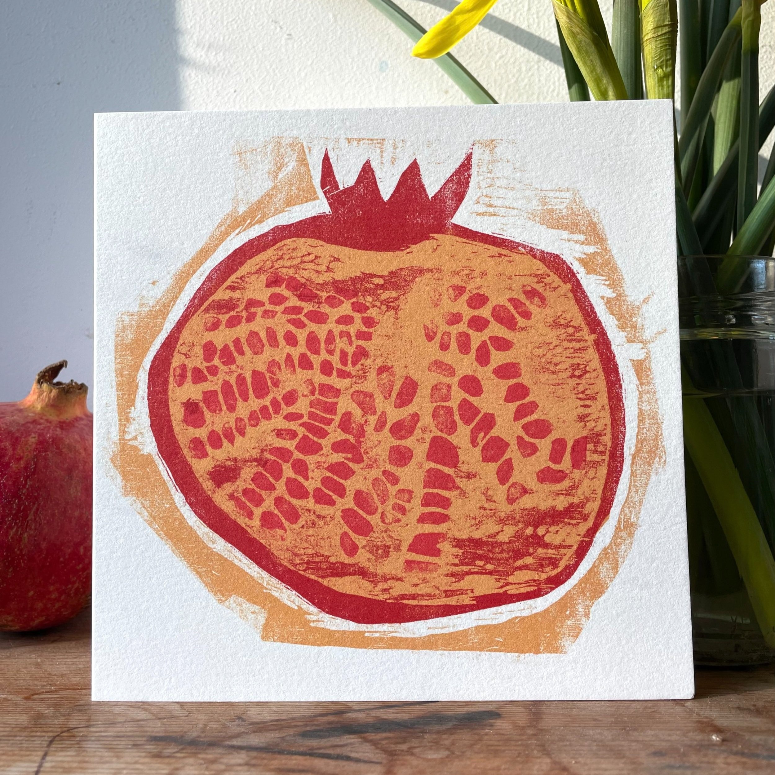 Linocut printed greetings card of a pomegranate fruit locally made in Bristol