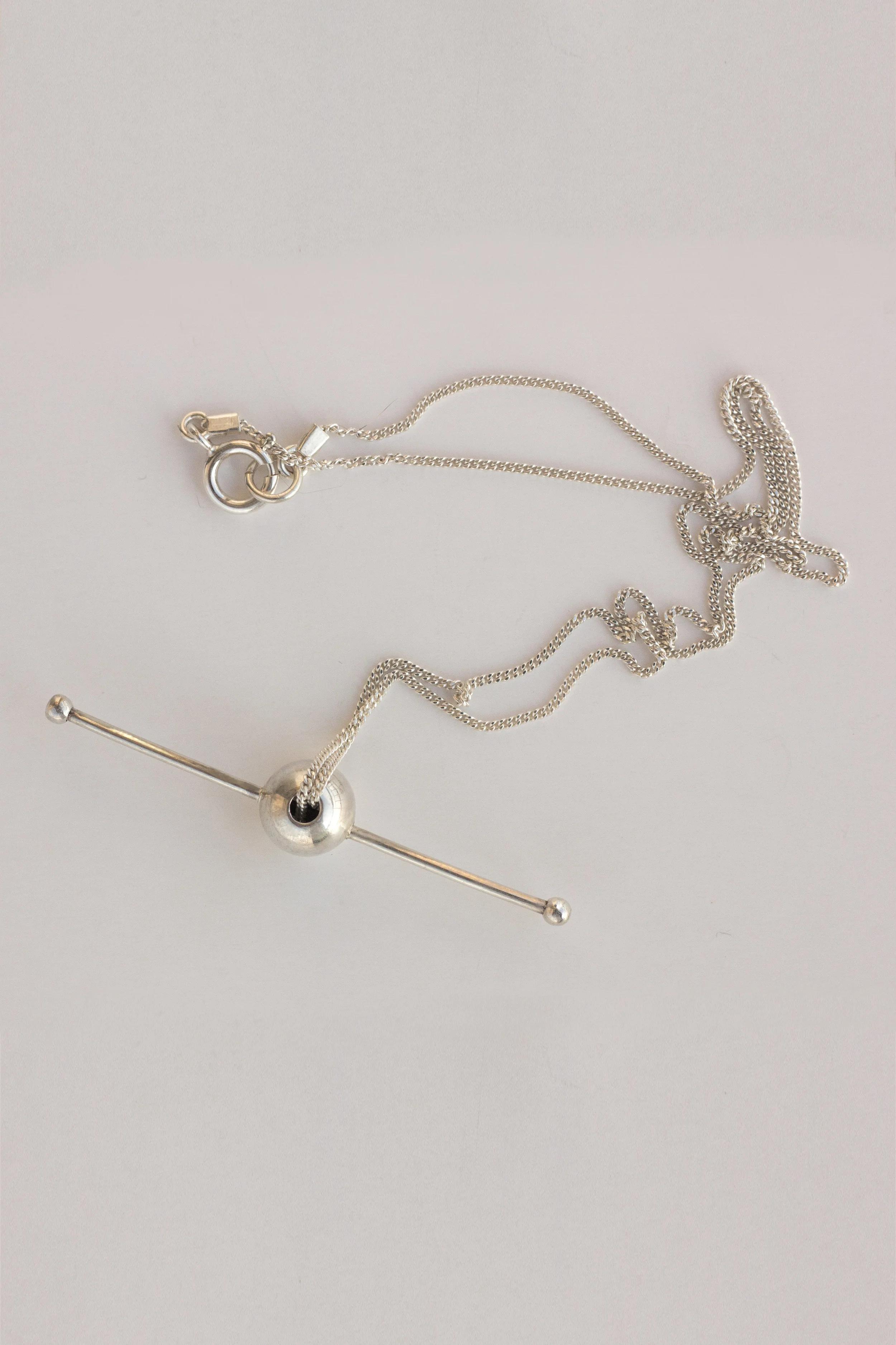 saturn necklace silver.jpg