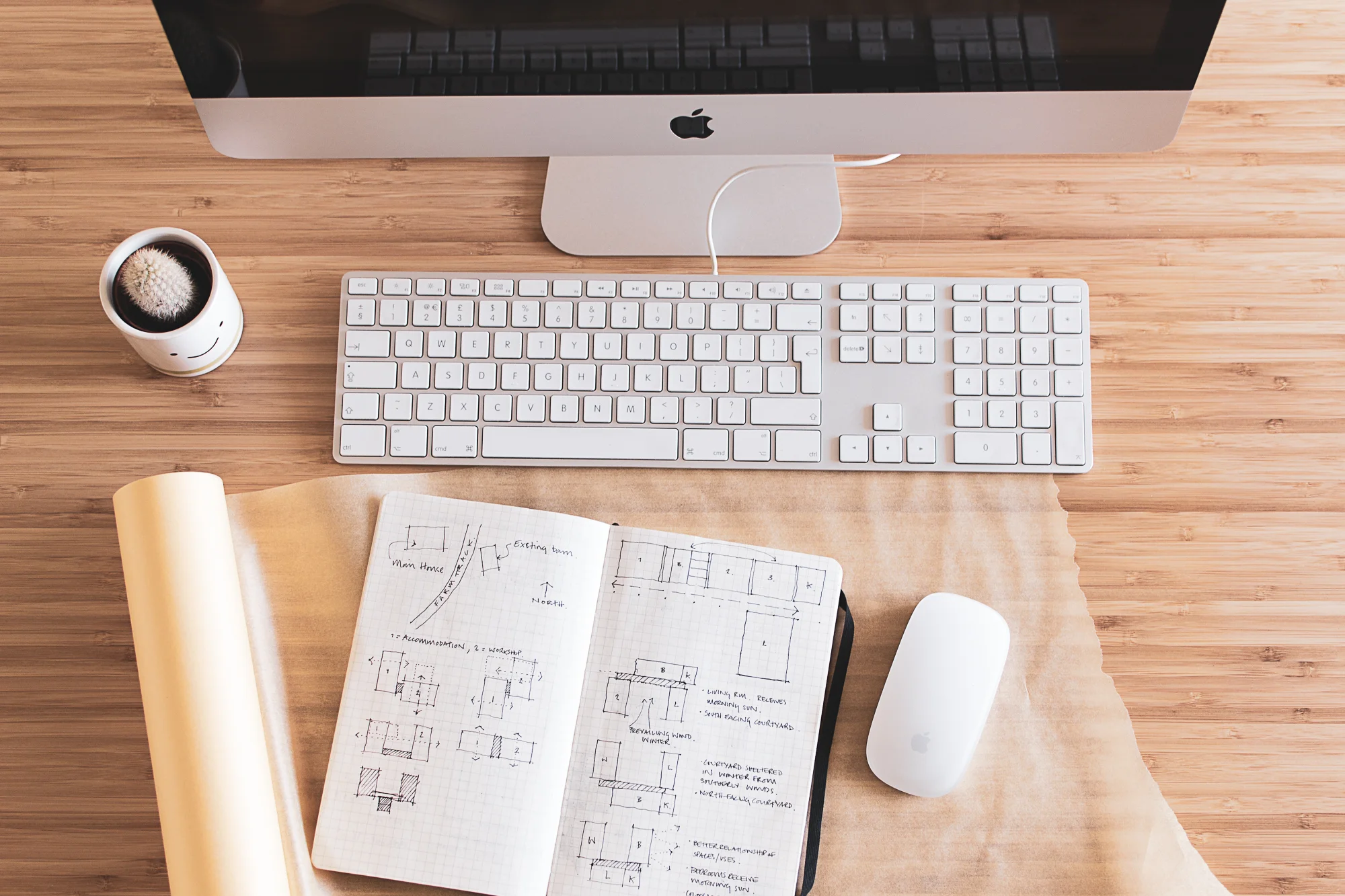 The desk of Worcestershire architect, David Holland. Designing new homes, extensions, remodelling, low-energy and sustainable buildings.