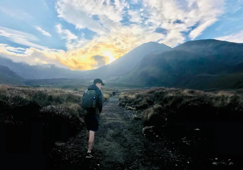 First few steps of the Tongariro Alpine Crossing. Gorgeous sunrise over “Mt. Doom.”