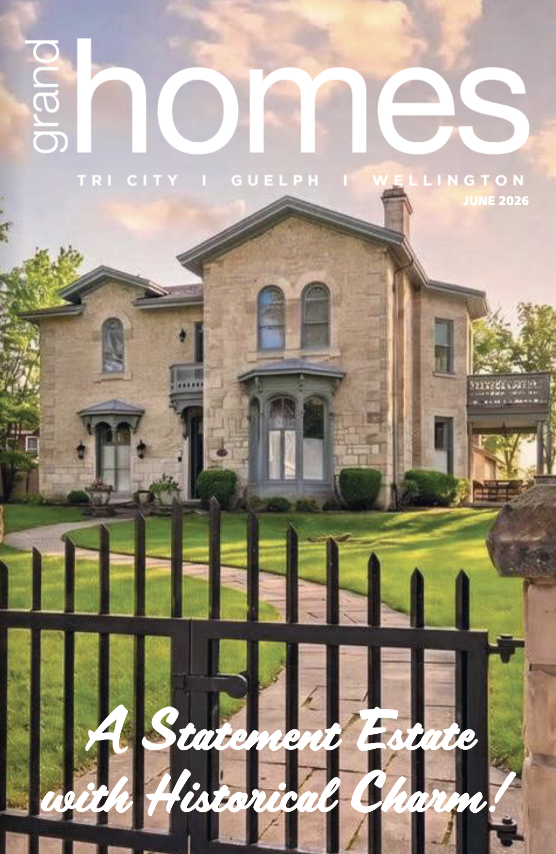 Front cover of Grand Homes real estate magazine with a mansion on it.