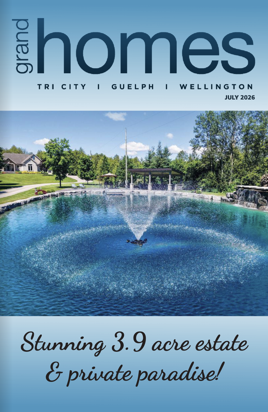 Front cover of a real estate magazine featuring a large pond with a fountain.