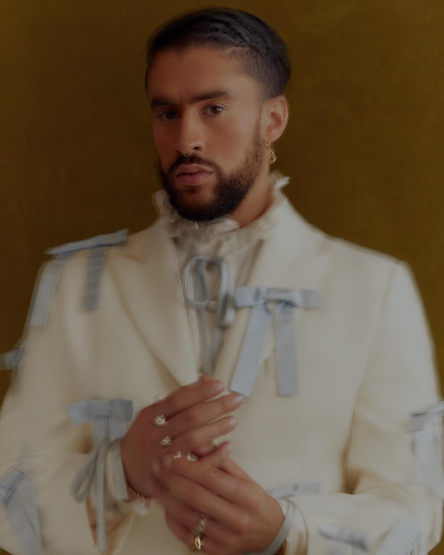 @badbunnypr wearing @tanner.fletcher for our @time cover story 🎀✨