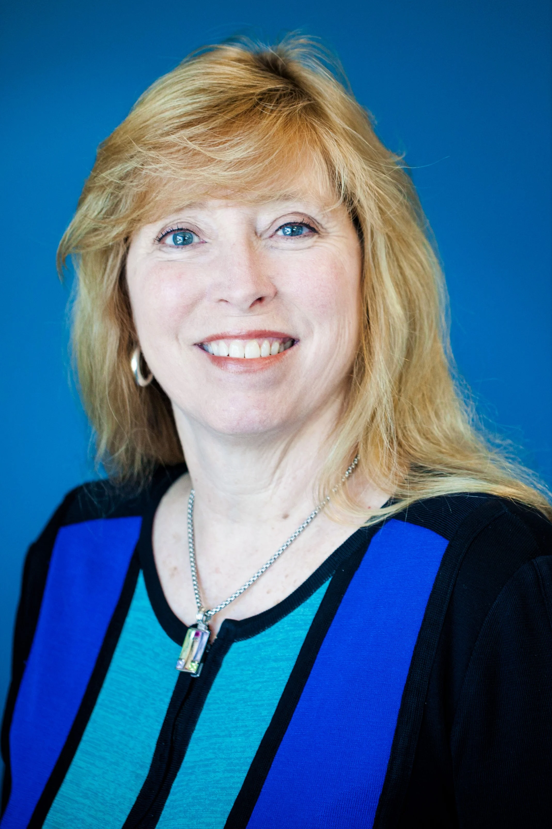9388bdfa71ba-Donna_New_Headshot_6.1.18.jpg