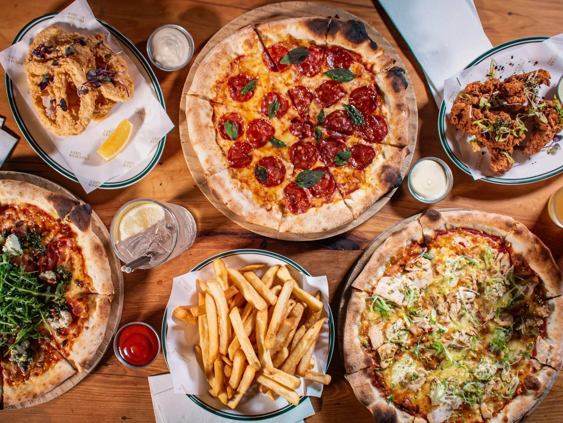 Pizzas, fries and shared plates for a group lunch or dinner at Freeman & Grey in Ponsonby