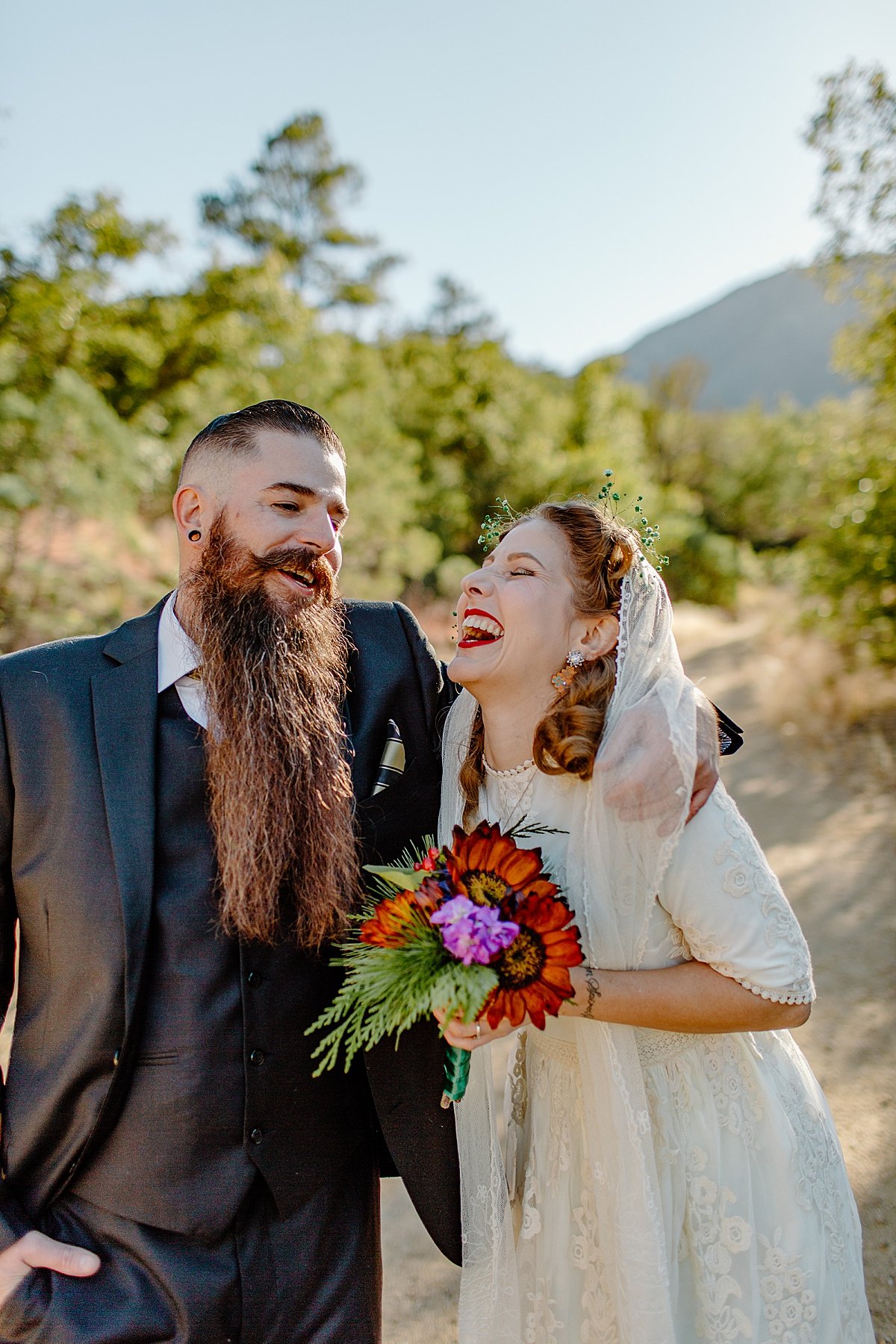  bride and groom laughing before Tucson vow renewal with friend officiant  