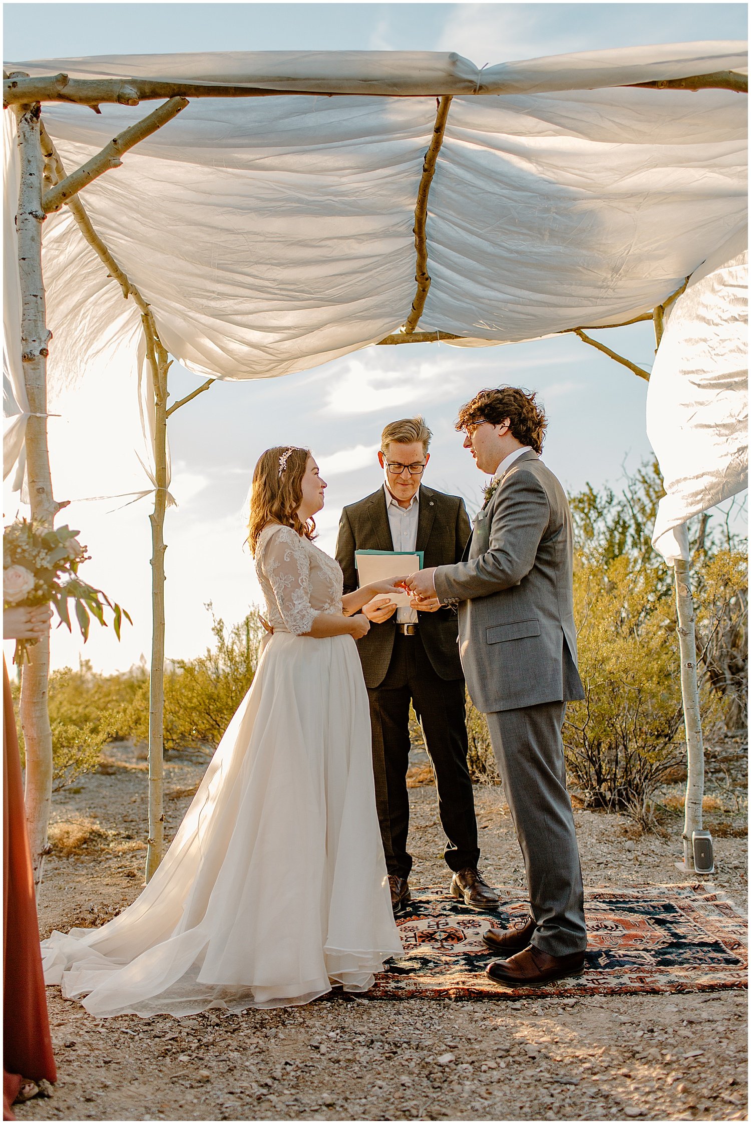  bride and groom facing one another at Tucson Intimate Wedding ceremony  