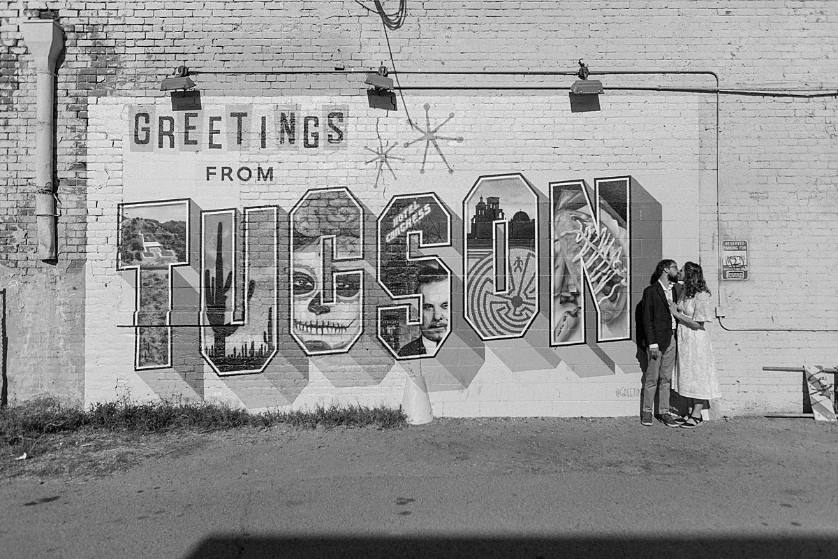  black and white Tucson mural with couple kissing by Lucy Bouman Photography  