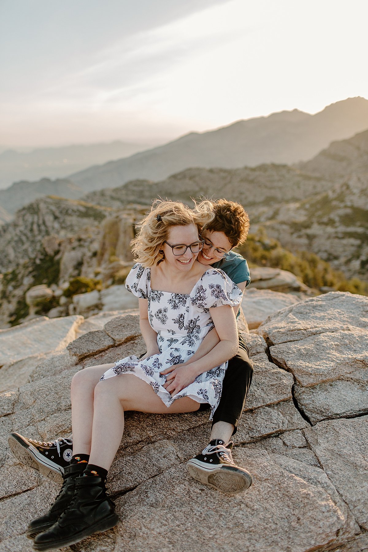 Couple sitting between each other's legs on Canyon by Lucy Bouman photography 