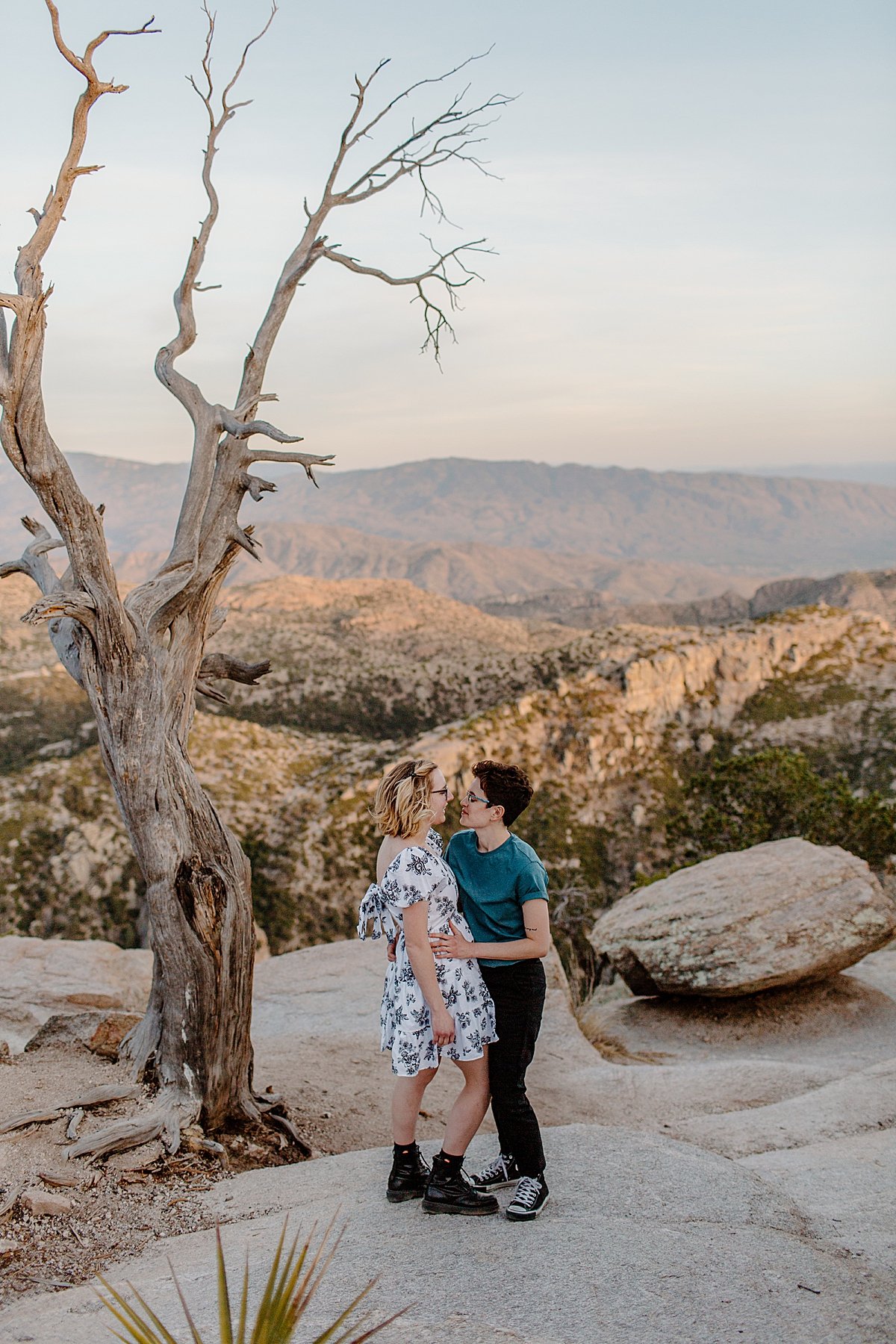  Girls holding hands standing under tree at Mount Lemmon by Lucy Bouman photography  