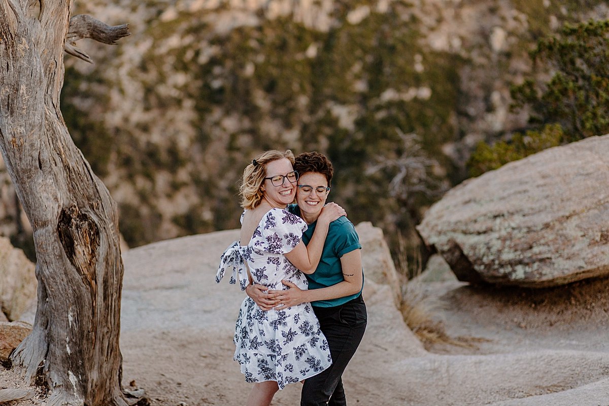  couple happy at Windy point in Arizona with Tucson engagement photographer 