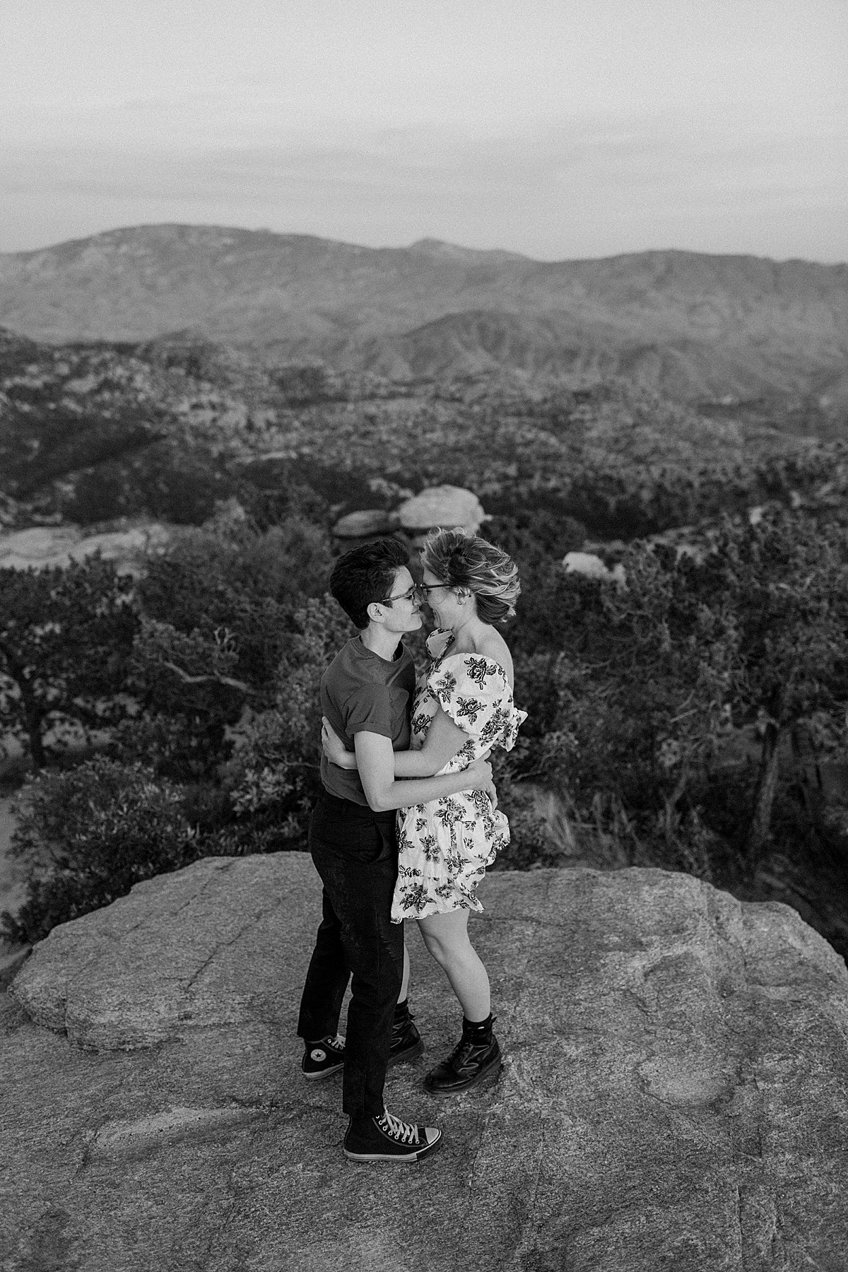  Black and white kissing portrait of couple overlooking Mount Lemmon by Lucy Bouman 