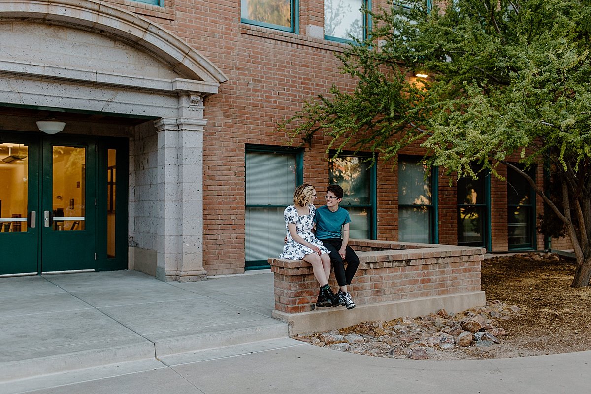  Sitting on campus building entryway with lesbian couple by Lucy Bouman photography 