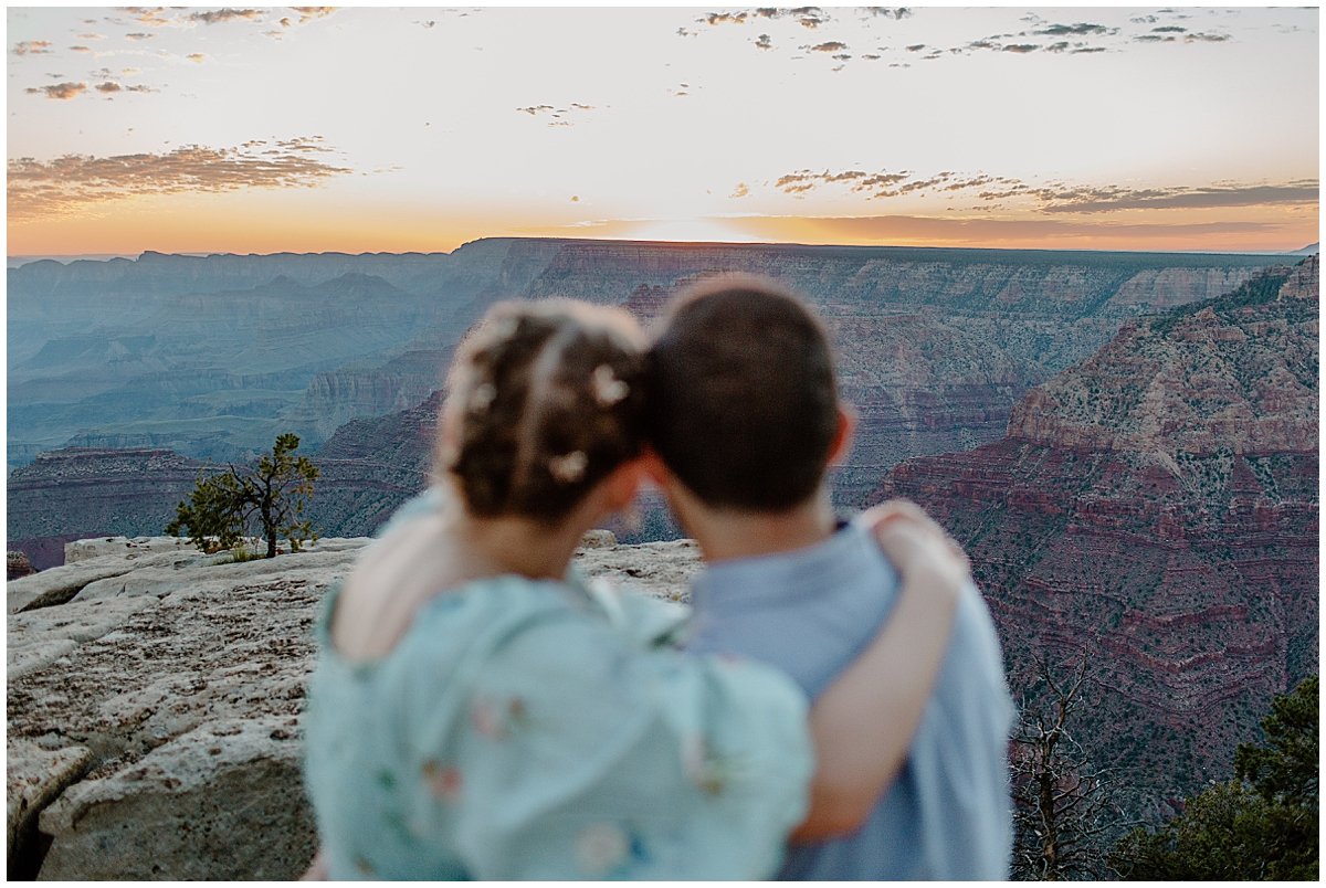  Couple looks out at Grand Canyon Engagement Session 