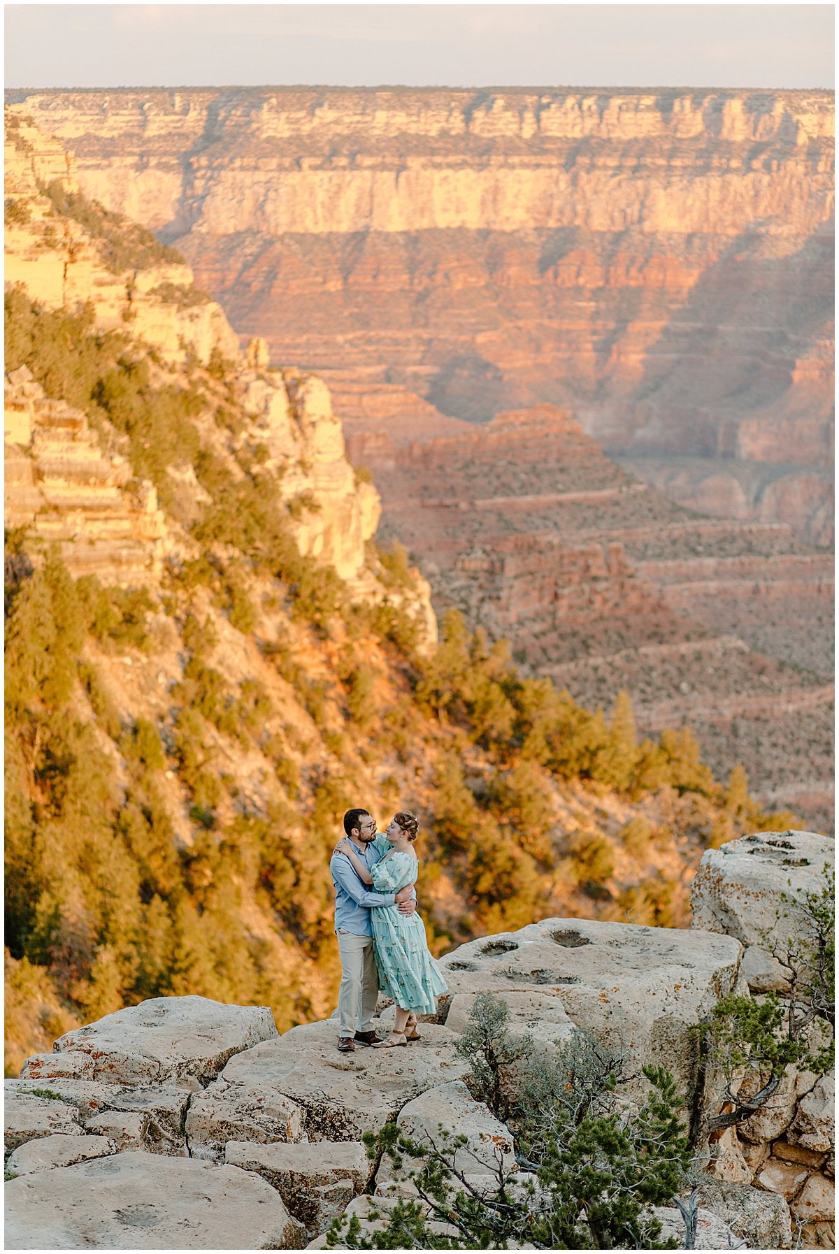  Fiances stand on rocks for Arizona Couples Photographer 