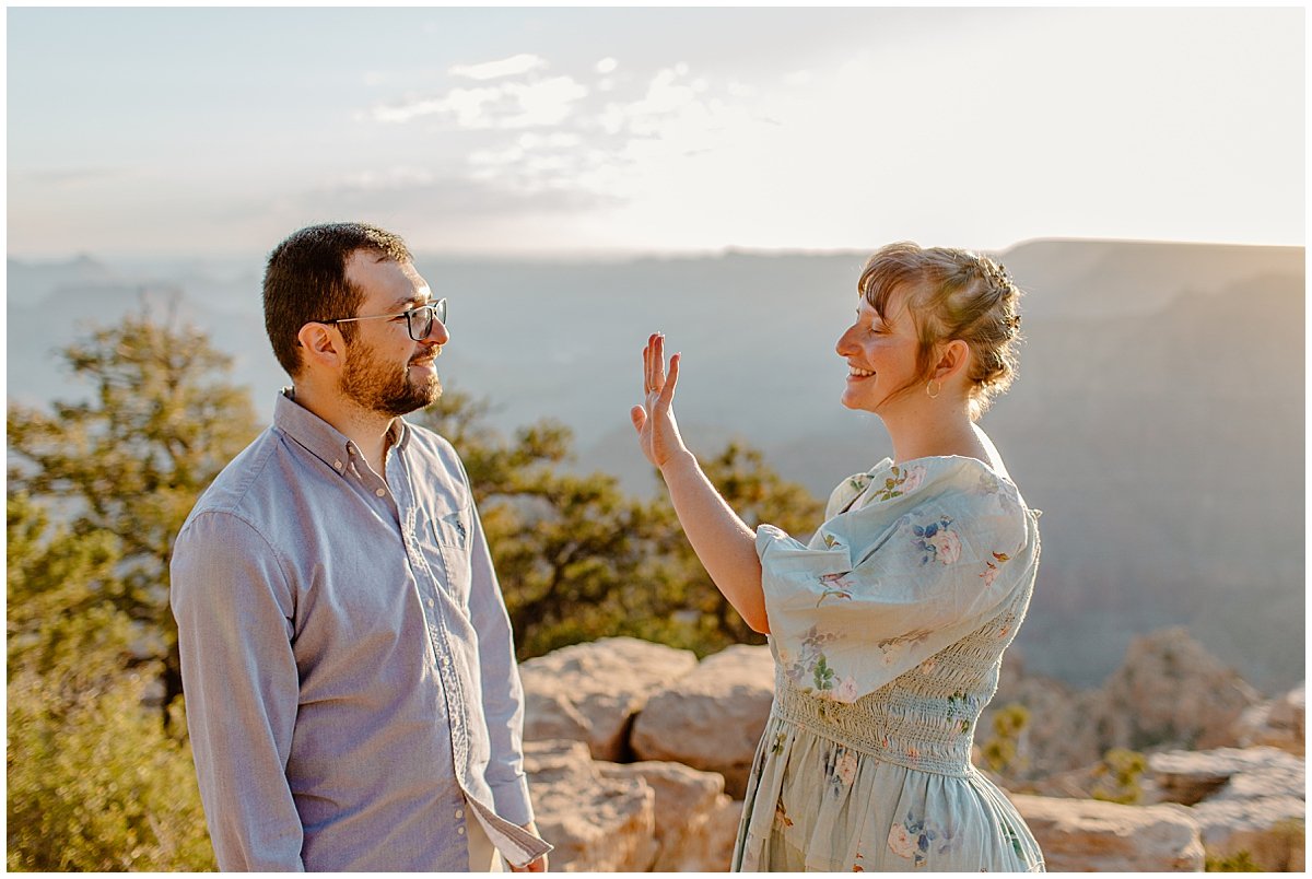  Woman admires new ring by Arizona Couples Photographer 