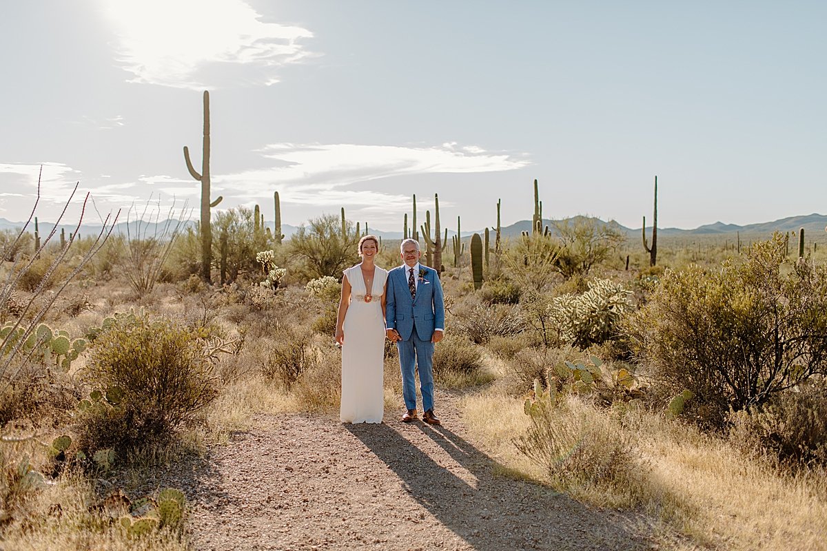  Newlyweds in desert scene  by Lucy Bouman Photography 