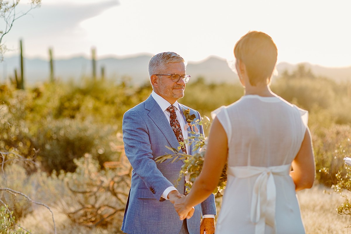  newlyweds dance in golden hour at Saguaro National Park 
