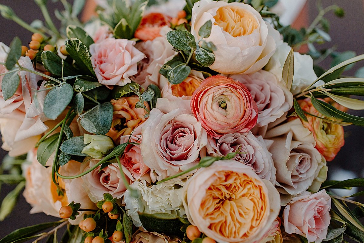  Dusty orange and pink wedding flowers  by Lucy Bouman Photography 