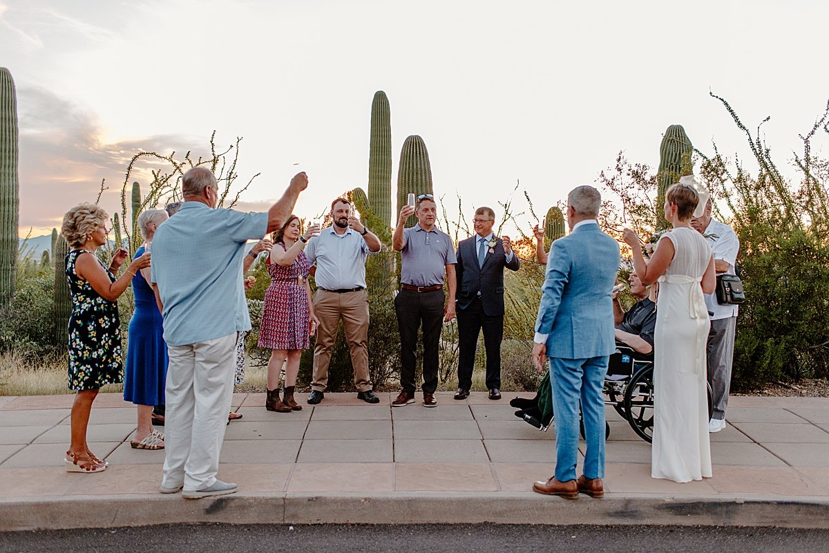  Bride and groom celebrate with friends for tiny wedding at Saguaro National Park 